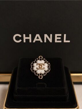 CHANEL stamped White and Gold Camellia CC pendant connector